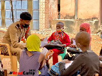 A group of pupils reading a book