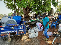 Some residents of Kandiga seated at the Customs checkpoint