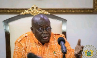 President Akufo-Addo with his hands stretched