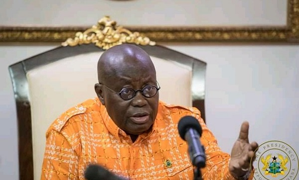 President Akufo-Addo with his hands stretched