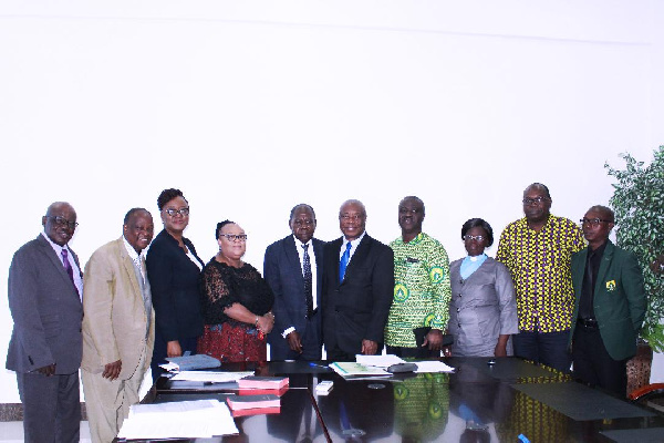 The Board Members in a group photograph