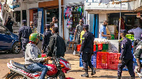 People prepare to close their shops for the day, in Kigali, PHOTO | CYRIL NDEGEYA | NMG