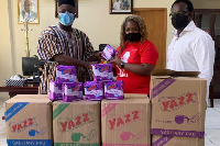 Ms Effie Grant, executive of NPP UK branch presents pads to Pru West MP