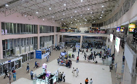 File photo: Staff and travellers at an airport