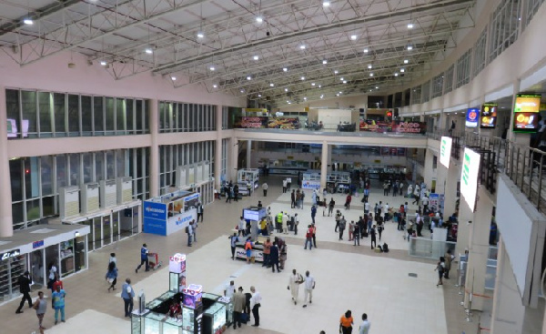 File photo: Staff and travellers at an airport