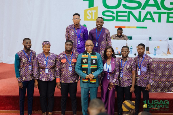 Most Rev. Samuel Noi Mensah surrounded by USAG executives