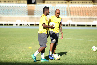 Ghana players Asamoah Gyan and Dede Ayew