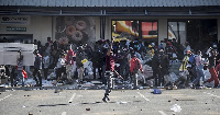 Looting of retail centers broke out in several areas of Johannesburg