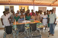 Airtel employees in a pose with staff and management of Abokobi community clinic.