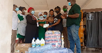 Abbi Ima presenting the items to the Kintampo Municipal Hospital