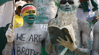 A file photo of a Ghanaian and a Nigerian fan at the Sports Stadium