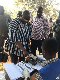 Vice President Dr. Mahamudu Bawumia going through the voting process