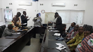 Agriculture Minister (middle) swearing in Board Members