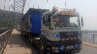 A heavy-duty truck on the Adomi Bridge