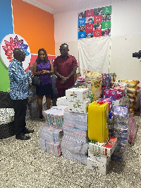 Bola Ray and his wife, Dorcas Anokye Adisi with Christian Appiah