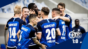 Patric Pfeiffer's teammates join him to celebrate his goal