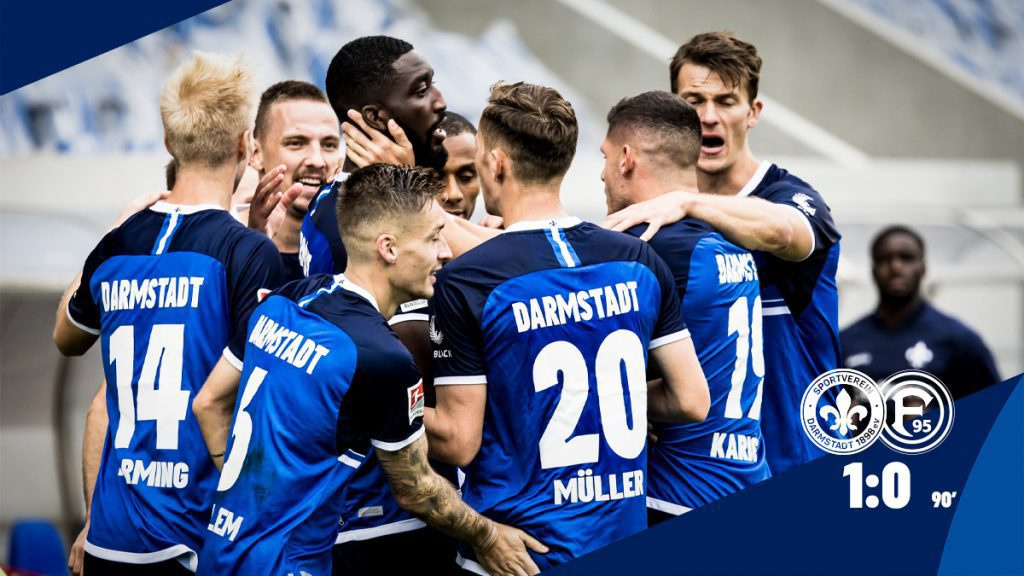 Patric Pfeiffer's teammates join him to celebrate his goal