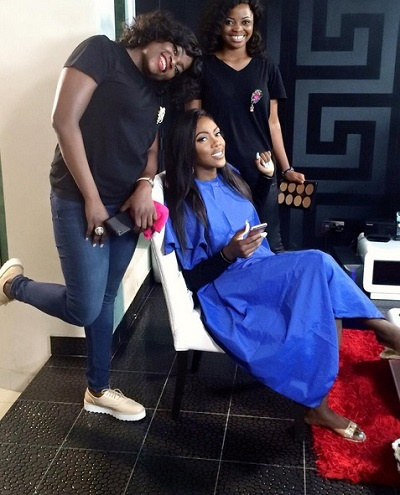 Tiwa Savage (seated)