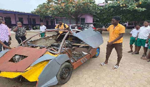 18-year-old JHS graduate, Kelvin Odartey with his manufactured car