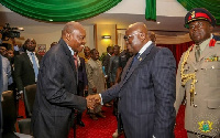 President Akufo-Addo in a handshake with Justice Atuguba