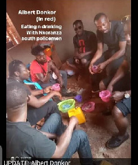 The late Albert Donkor with some men believed to the police officers