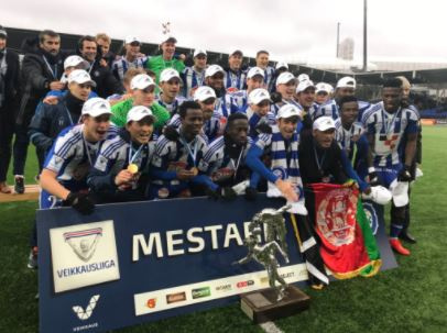 Mensah and Annan celebrating title with team members