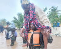 Soldiers rescuing flood victims