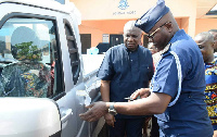 Boakye Agyarko presenting the vehicle to the police