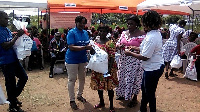 Executives of the NGO donating to the needy