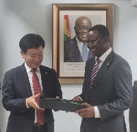 Chairman Kim Yoon Shik and Commissioner-General of the GRA, Rev Ammisshaddai-Owusu