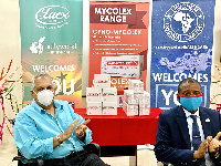 Mr. Raj Mohan ( Chairman of the Unichem Ghana Group) with Mr. Solomon Odamtten Senior Pharmacist