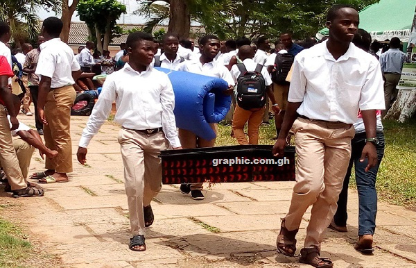 A photo of students returning to school