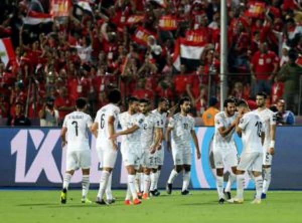 Egyptian players celebrating their victory over Uganda