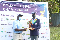 Torgah receiving his trophy