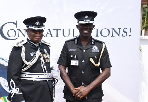 Acting IGP COP Dampare (right) with his immediate predecessor James Oppong-Boanuh