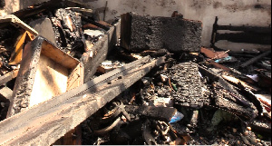 All items in the room , as well as the roofing on the apartment, were burnt beyond salvage