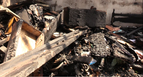 All items in the room , as well as the roofing on the apartment, were burnt beyond salvage