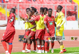 Asante Kotoko players celebrating a goal