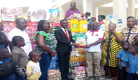 Bishop Bernard Ogyiri Asare presenting the donations to Effia-Kwesimintsim Municipal Assembly