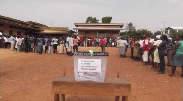 Electorates wait for their turn to vote at a polling station.