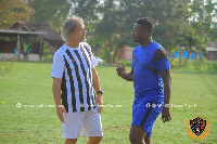 Asamoah Gyan interacting with Legon Cities gaffer