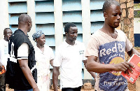 The suspects appeared in court holding Bibles