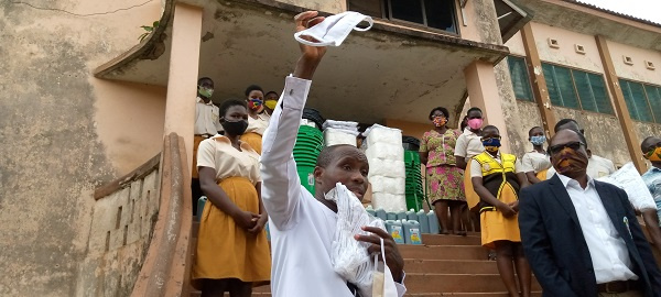 DCE, Mr. Kwasi Bonzoh speaking to students at Nkroful Agricultural Senior High School