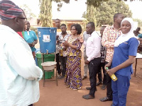 Hajia Zuwera Ibrahimah presenting Veronica buckets to Salaga government hospital