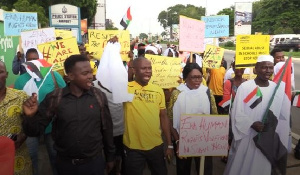 Campaign Coordinator of Amnesty International Ghana, Samuel Agbotsey (Middle in yellow)