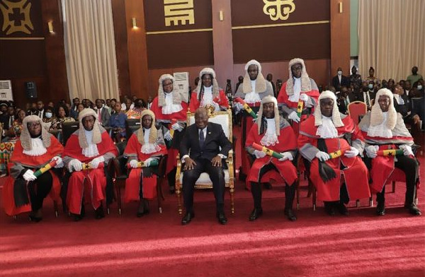 President Akufo-Addo after swearing in 10 new High Court judges