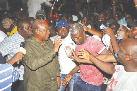 Former President John Mahama being welcomed at the party office at Adabraka