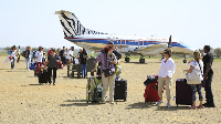 Tourists from different countries arrive at the Seronera Airstrip in Mara region