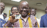 President Nana Addo Dankwa Akufo-Addo holding his Ghana card