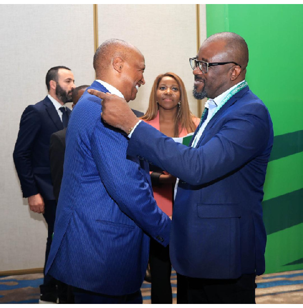 Kurt Okraku (right) will  CAF President Dr. Patrice Motsepe